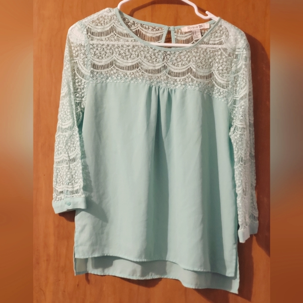 Long sleeve cut out blouse